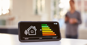 A photo of a phone measuring energy consumption of a building showcasing how InnoDez can help with energy compliance and engineering.