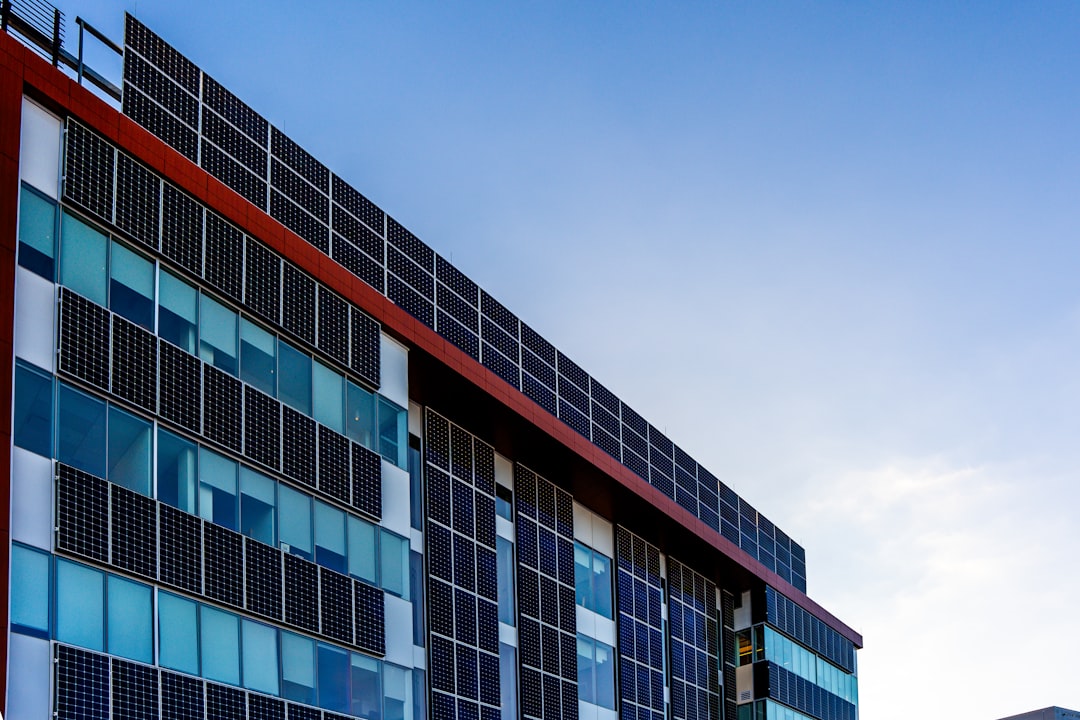 Modern commercial building with rooftop energy systems illustrating building performance strategy