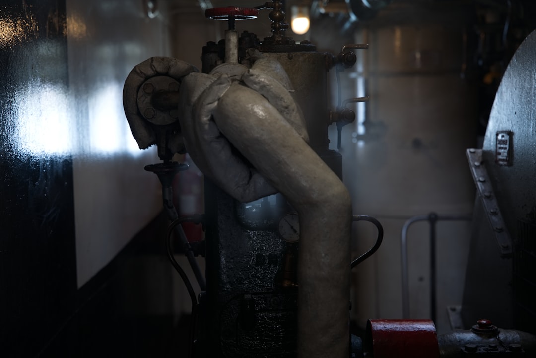 Mechanical room with HVAC piping and equipment illustrating MEP routing and service access