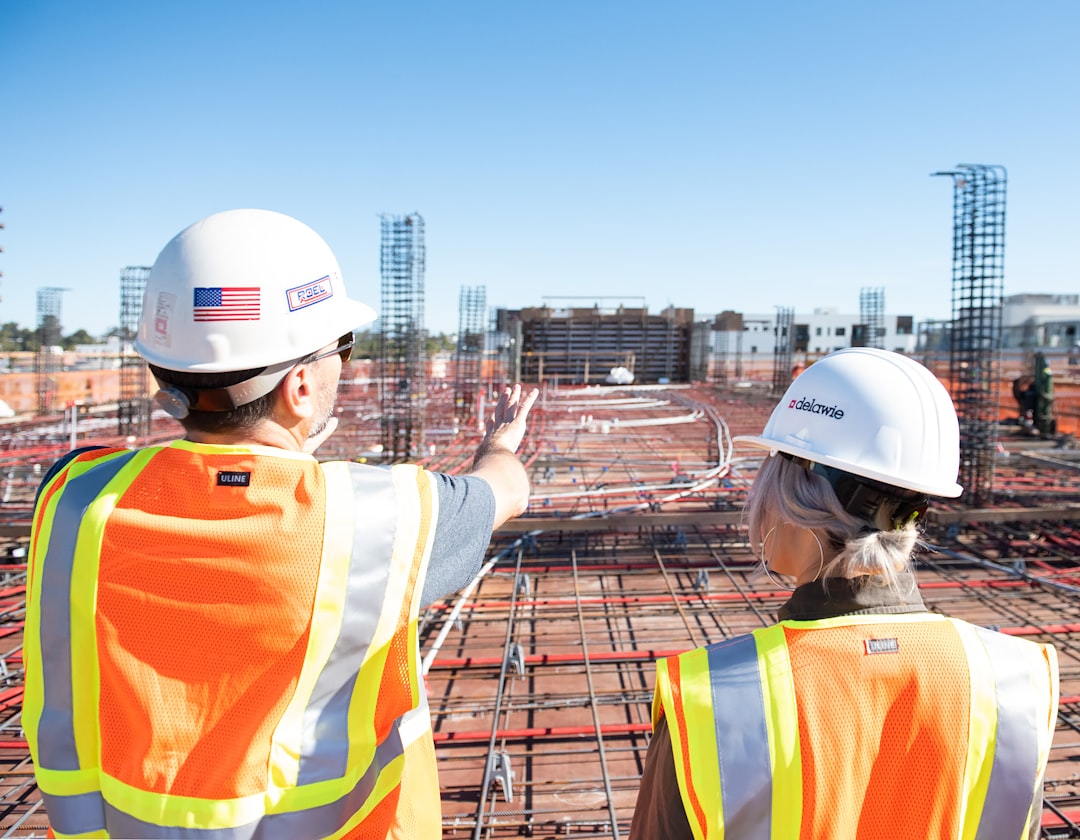 Construction professionals coordinating project conditions before installation