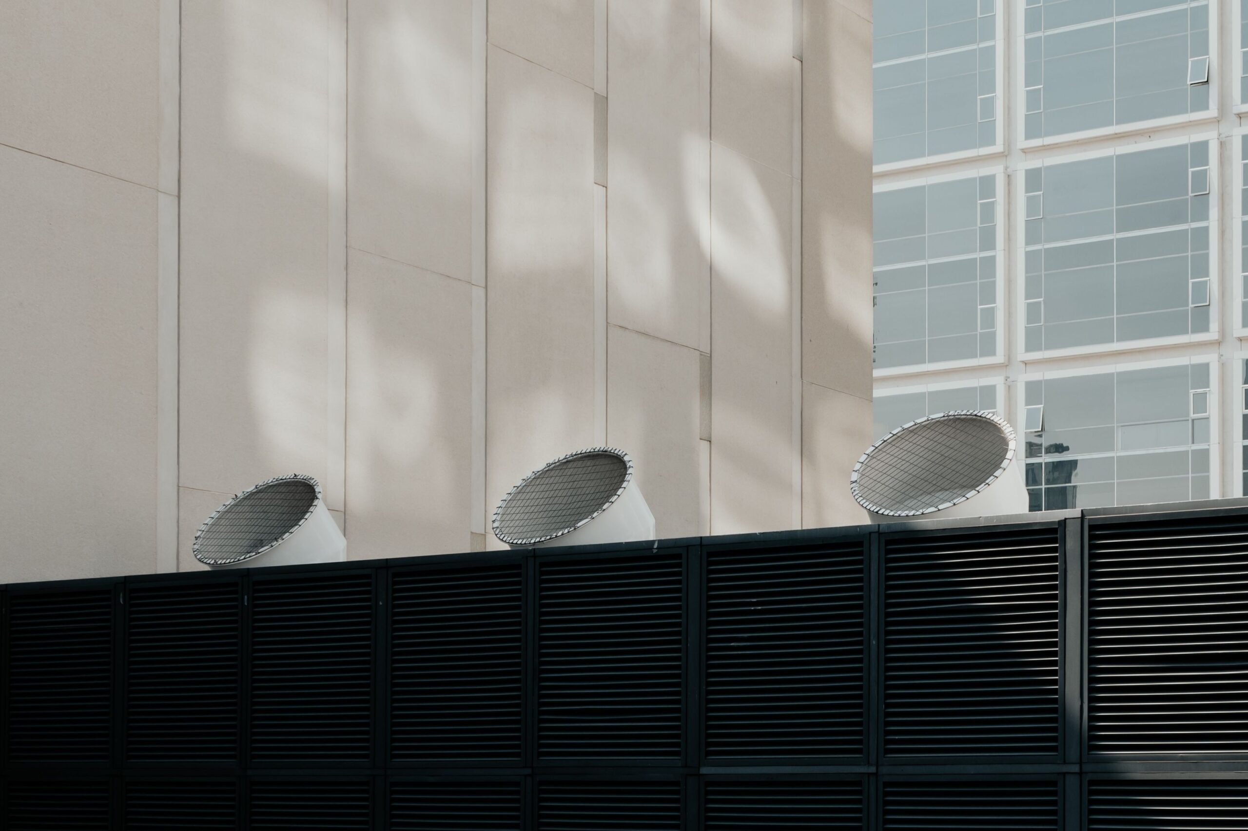 Rooftop ventilation system with metal ductwork on a commercial building